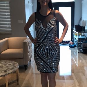 Silver sequins and black dress